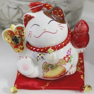 Mèo đại phúc cầm quạt